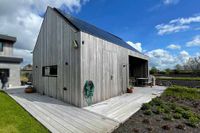 Modern houten tuinhuis - Eshuis Architect